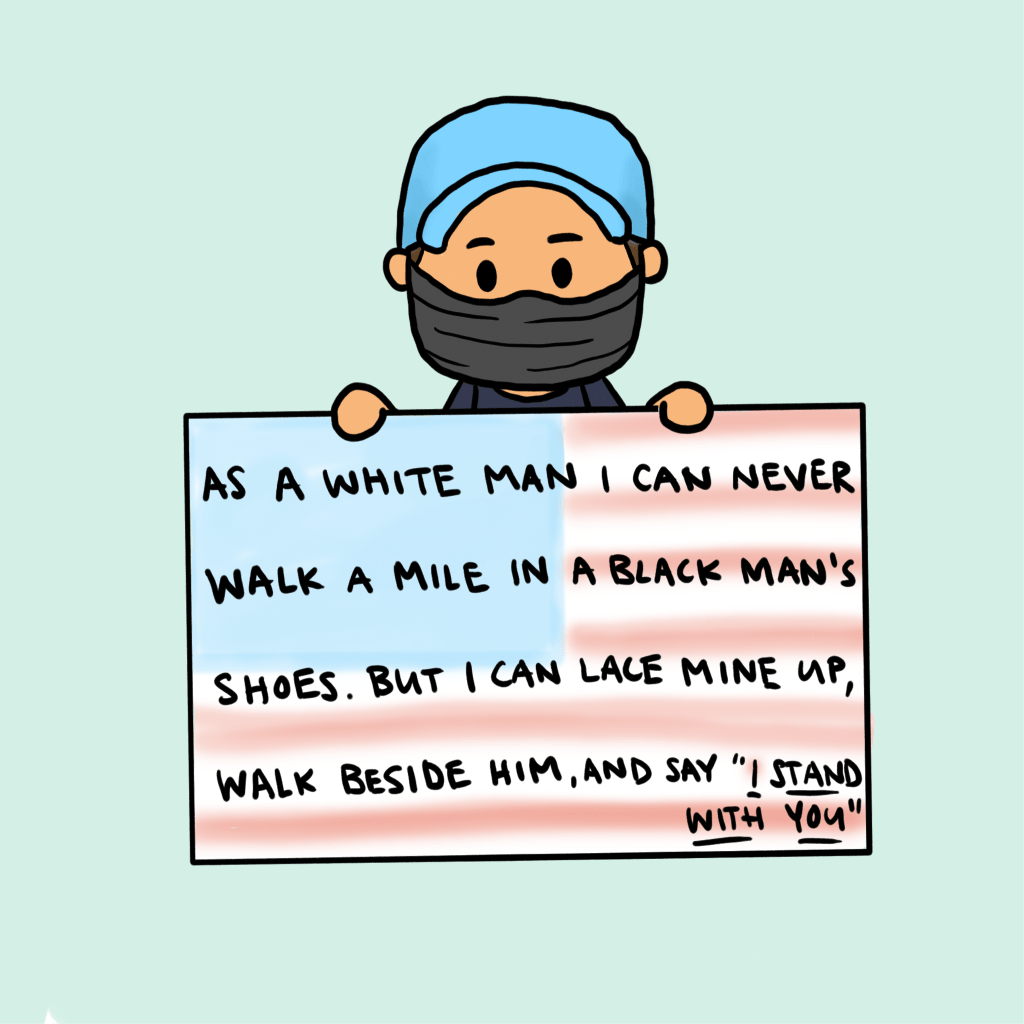 Cartoon of a white man holding a protest sign saying "As a white man I can never walk a mile in a black man's shoes. But I can lace mine up, walk beside him, and say 'I stand with you'"